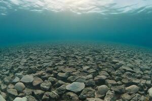 A view of the ocean floor from under water photo