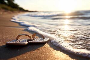 Flip flops on the beach at sunset photo
