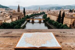 A map of italy on a wooden table photo