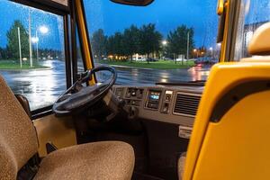 A view of the inside of a bus at night photo
