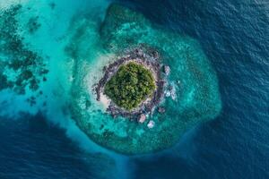 Aerial view of small island in the middle of the ocean photo