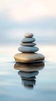 Serene Stacked Stones in Water A Moment of Peaceful Reflection photo