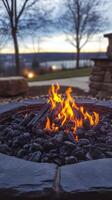 Outdoor Fire Pit at Dusk with Glowing Flames photo