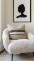 Plush Chair with Striped Pillow and Portrait Silhouette - A Modern Home Decor Scene for Relaxation and Stylish Living photo