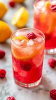 Refreshing Raspberry Lemonade Cocktail A Delicious Summer Drink with Fresh Fruit, Ice, and Citrus Flavors for Parties and Celebrations photo