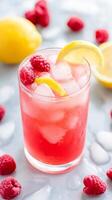 Icy Raspberry Lemonade A Refreshing Summer Drink with Fresh Raspberries, Zesty Lemon, and Chilled Ice Cubes for a Delicious and Thirst-Quenching Treat photo