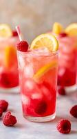 Refreshing Raspberry Lemonade A Zesty Summer Drink with Fresh Raspberries and Lemon, Perfect for Hot Days and Celebrations photo