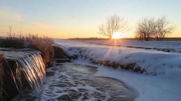 Winter's Kiss A Tranquil River Cascade at Sunset, Embraced by Snow and Ice, Reflecting Sunlight in a Serene Landscape photo
