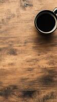 Aromatic Coffee Cup on Rustic Wood Table A Simple Still Life with Dark Beverage, Warm Texture, and Rich Grain for a Refreshing Morning Break photo