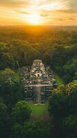 Ancient Mayan Temple in the Jungle at Sunset photo