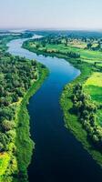 Serene River Winding Through Lush Landscapes photo