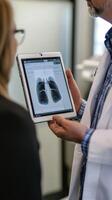Medical Diagnosis with X-Ray on Tablet photo