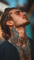 Stylish Man with Intricate Tattoos and Accessories photo