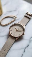 Delicate Rose Gold Watch with Beige Leather Strap A Timeless Classic photo