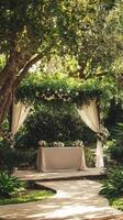 Outdoor Wedding Ceremony in a Lush Garden Setting photo
