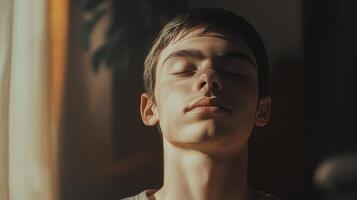 A Peaceful Moment Captured A Young Man's Tranquil Portrait photo