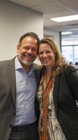 Smiling Business Couple at a Corporate Event photo