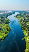 Majestic Nile River An Aerial View of Egypt's Lifeline, A Scenic Journey Through Lush Landscapes, Tranquil Waters, and Timeless Beauty, A Captivating Travel Destination photo