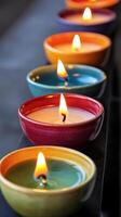 A Symphony of Colorful Candles Illuminating Tranquility and Warmth, Perfect for Relaxation, Meditation, and Creating a Romantic Ambiance. photo