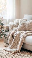 Cozy Knit Blanket on Couch A Warm, Soft, and Stylish Home Decor Accent for Relaxing in Comfort. Perfect for Interior Design, Adding Texture and Elegance to Any Room. photo