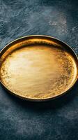 Elegant Gold Plate on Dark Backdrop photo