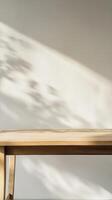 Minimalist Wooden Table with Shadow Play A Clean and Modern Interior Scene for Product Mockups, Display, and Creative Staging with Neutral Tones and Bright Daylight photo