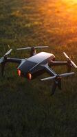 Drone on Grass at Sunset photo