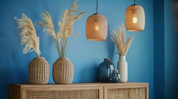 Harmonious Interior Pampas Grass, Wicker Lamps and Blue Wall photo