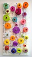 Vibrant Yarn Spools on Display A Colorful Crafting Collection for Creative Hobbies and Textile Art, Showcasing a Variety of Textures and Patterns photo
