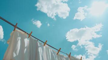 White Clothes Drying Under a Sunny Sky photo