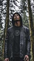 Stylish Man in a Leather Jacket, Forest Portrait photo