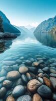 Serene Mountain Lake with Crystal Clear Water and Stones photo