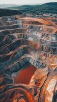 Aerial View of a Dramatic Open-Pit Mine Landscape photo