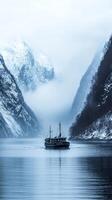 Winter Fjord Voyage Majestic Mountains and a Calm Boat photo