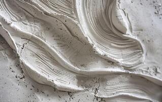 A close up of a white wall with some waves photo