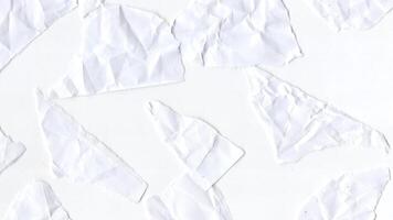 Looping crumpled paper with torn edges, textured white surface for soft layers video