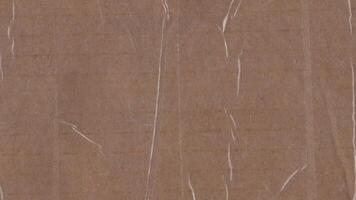 Realistic cardboard and masking tape texture animation background video