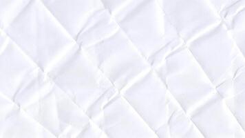 Soft crumpled paper loop with white background and subtle grain video