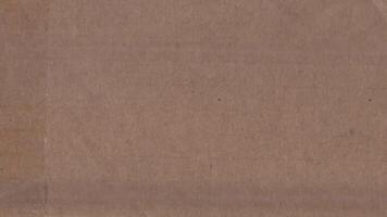 Seamless animation of taped cardboard with subtle scratches and folds video