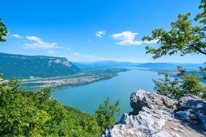 A view of the lake from the top of a mountain photo