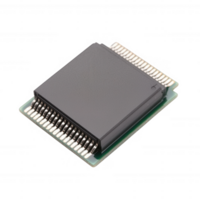 A close-up view of a microchip with a black casing on a green circuit board against a white background. png