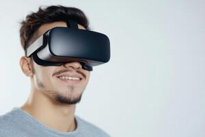 Young man enjoying virtual reality experience with a smile in a modern setting photo