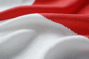 A close up of a red and white flag photo