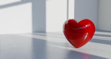 A shiny red heart sculpture casting shadows in a minimalist space. photo