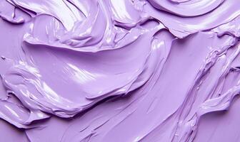 Close-up of smooth lavender paint texture on a canvas surface. photo