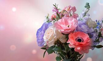 A vibrant bouquet of mixed flowers against a soft, colorful background. photo