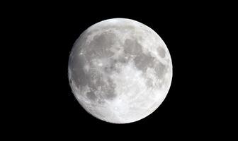 A detailed view of the moon showcasing its surface features. photo