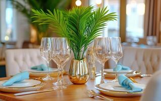 Nautical-inspired dining setup featuring an ancient sago palm centerpiece with elegant tableware in a bright atmosphere photo