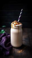 Creamy caramel milkshake enjoyed at a rustic farm table on a cozy evening photo