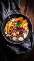 Delicious farm to table breakfast bowl with fresh fruit and nuts served in a rustic setting photo